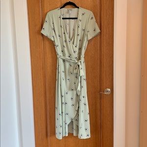 Cute low calf-length mint green faux wrap dress